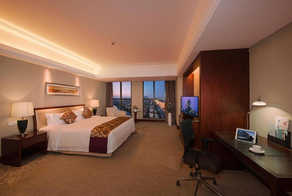 Shuguang International Hotel Kunshan Kunshan  Exteriör bild