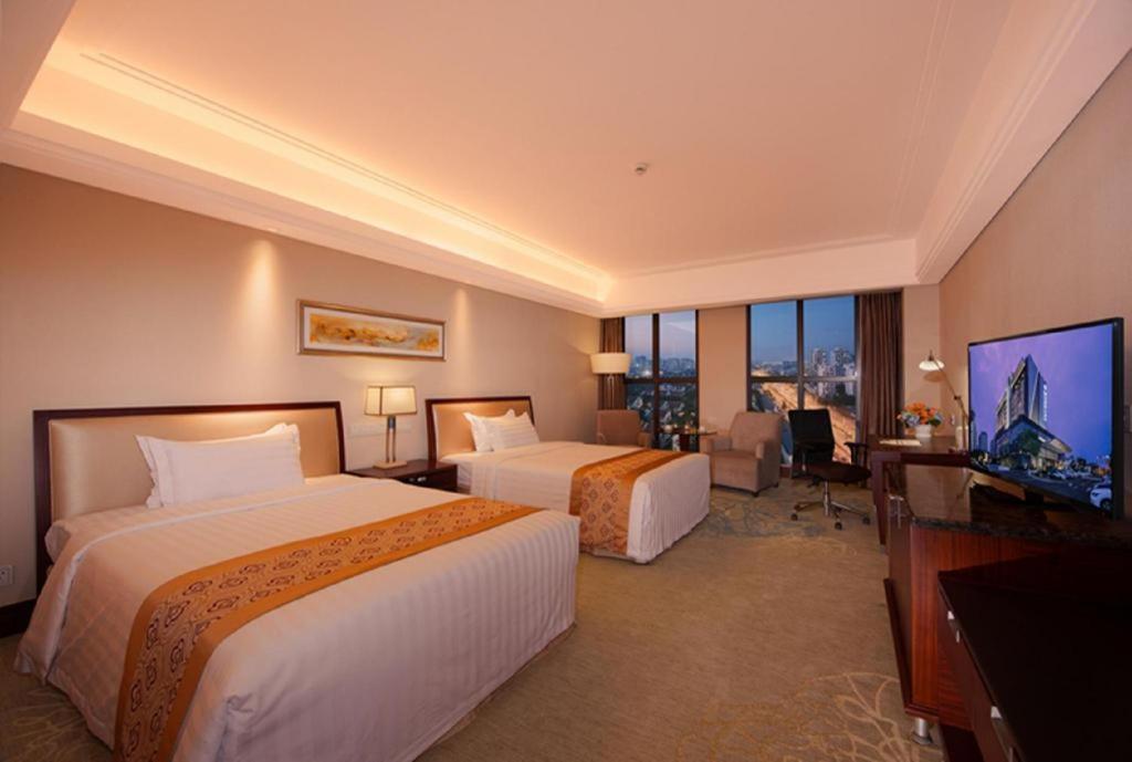 Shuguang International Hotel Kunshan Kunshan  Exteriör bild