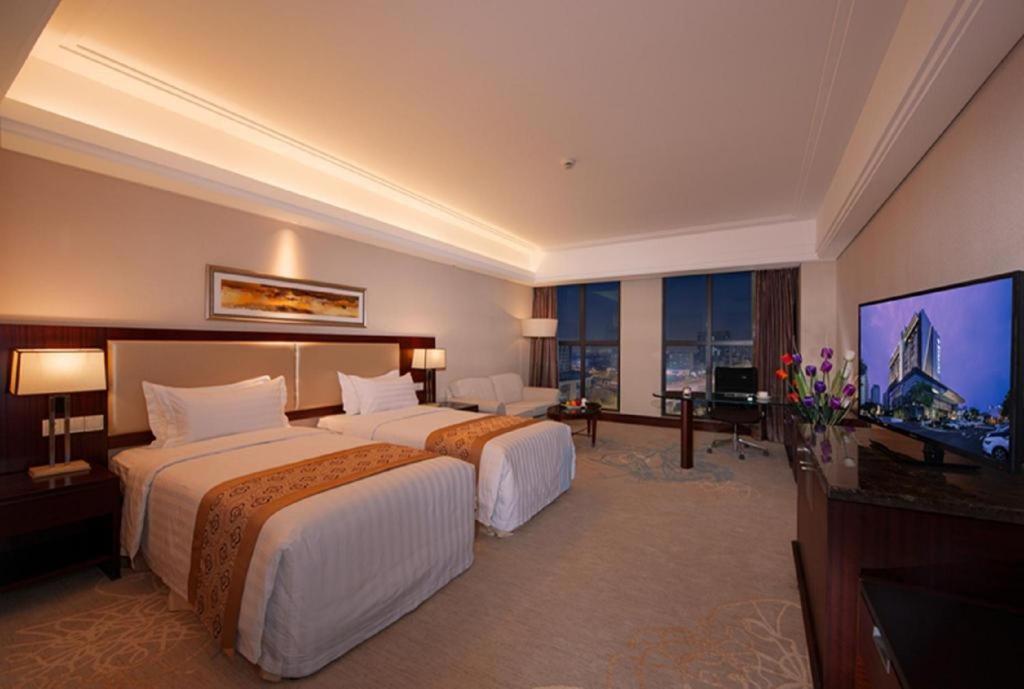 Shuguang International Hotel Kunshan Kunshan  Exteriör bild