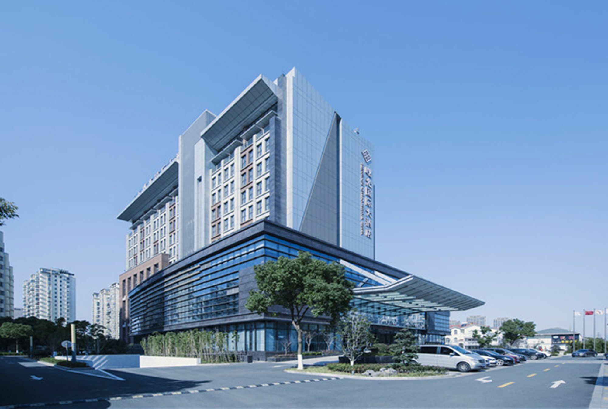 Shuguang International Hotel Kunshan Kunshan  Exteriör bild